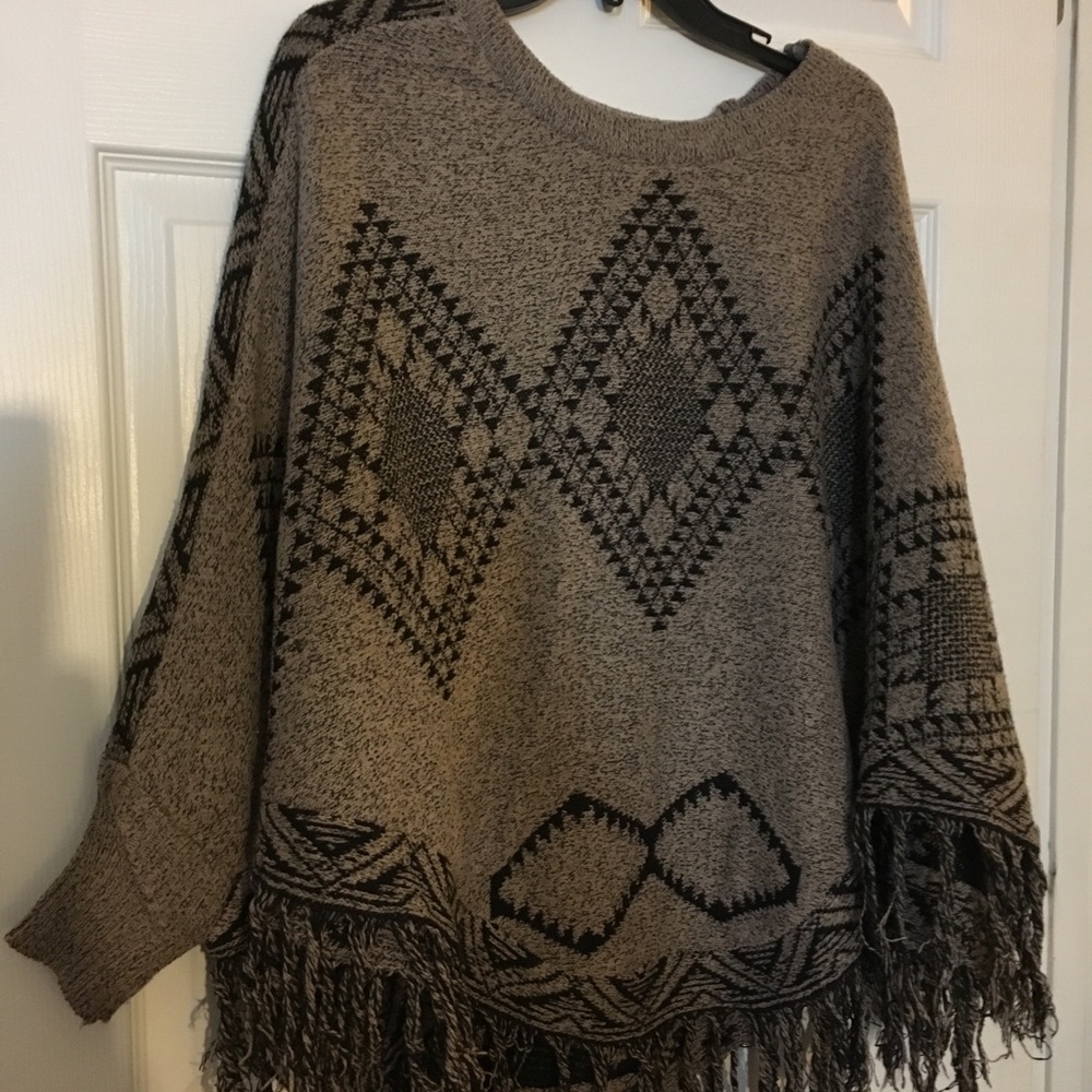 Poncho sweater with sleeves